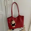 Bolso de mano simple de gran capacidad transfronterizo, textura versátil, bolsa tote, sensación de alta gama, nicho, apariencia retro, bolso de hombro único