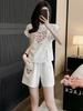 Novo Terno Estilo Nacional Estilo Chinês para Mulheres, Moda Verão, Estilo Estrangeiro, Redutor de Idade Celebridade da Internet Manga Curta Shorts, Conjunto de Duas Peças Esportivo e Casual para Mulheres
