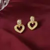 Pendientes de Alta Gama de Moda Coreana Diseño Coreano Pendientes Huecos de Corazón con Diamantes Lujo Accesible Pendientes de Nicho para Mujer