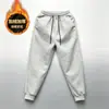 Pantalones de chándal de alta calidad, forrados de forro polar y engrosados para otoño e invierno, con un diseño moderno, adecuados para deportes y uso casual, y que proporcionan calidez. Nuevo estilo para hombre con puños elásticos