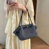 Tendencia coreana bolso versátil de nicho de un solo hombro bolso de mano diario para mujer nueva moda 2026 simple de verano tipo tote diario atmosférico
