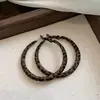 Pendientes redondos de moda para otoño e invierno con estampado de leopardo flocado, que presentan un diseño retro y exagerado con una estética única y distintiva
