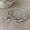 Pulsera de etiqueta metálica multicapa diseño para mujer nicho retro personalidad simple temperamento combinable pulsera de moda pulsera