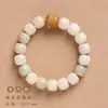 Gradiente de intemperie Bodhi DIY verde Yin cuero Bodhi tallado ola de la fortuna gato lindo borla pulsera simple