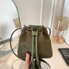 Bolsa de cordón suelta para mujer, nuevo estilo otoño 2026, bolso de mano de moda, bolso de hombro, bolso cubo retro para ir al trabajo, bandolera