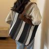 Bolsa de Lona Bolsa Tote Feminina Grande Capacidade Outono e Inverno 2026 Novo Estilo Versátil Cor Contrastante Textura Ombro Único Bolsa para Aula e Trabalho