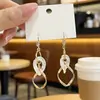 Elegantes Pendientes de Aro Transparentes de Colores Entrelazados con Ganchos para Orejas, Modernos Pendientes Largos de Borla Espiral Doble Retorcida