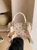 Bolsa Boston de alta qualidade estilo francês transfronteiriça para mulheres, novo modelo da primavera de 2026, estampa de desenho animado, bolsa de mão e transversal de grande capacidade