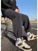 Pantalones de pana holgados para hombre para otoño e invierno, pantalones deportivos versátiles con forro polar, engrosados y ajustados en los tobillos, pantalones largos casuales de moda