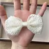 Grampo de cabelo com laço de bordado de renda doce de alta qualidade, capa de celular, acessórios de vestuário, acessórios para malas, sapatos e meias em lote