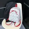 Mochila de Lunares con Lazo para Mujer 2025 Nueva Moda Más Fácil de Combinar Bolsa Escolar para Estudiante Otoño Mochila Ligera de Viaje