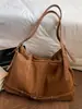 Bolso Retro de Gran Capacidad para Mujer Otoño e Invierno Casual 2025 Nuevo Bolso de Hombro Textura Popular de Este Año Bolso Tote para Viajar