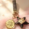 Regalos pequeños y prácticos para el Festival de Medio Otoño: campanilla de conejo rosa, moneda de la fortuna, llavero de pastel de luna, recuerdos promocionales corporativos