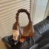 Bolso de mano plisado tipo nube de diseño nicho estilo coreano transfronterizo para mujer, nuevo modelo 2026, bolso cruzado de hombro elegante y con estilo