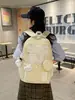 2026 Nova Mochila Estilosa Versão Coreana Grande Capacidade Versátil Bolsa Escolar para Alunos do Ensino Fundamental II e Médio Mochila Leve de Duas Alças