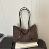 Colección de otoño 2026 transfronteriza: bolso de mano retro y moderno, bolso de hombro versátil y ligero, bolso de axila de gran capacidad