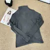 Camiseta base de moda minimalista de nicho de manga larga cálida, suave y muy elástica, corte ajustado, adecuada tanto para llevar debajo como por encima, top versátil 5255
