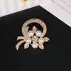 Broche Transfronterizo Nuevo de Alta Gama Lazo Insecto Flor Femenino Anti-Exposición Fijo Ropa Versátil Corsage