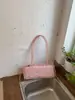 Bolsa de ombro moderna e fofa com design estiloso e único, novo modelo da primavera de 2026, bolsa simples para o dia a dia, bolsa de ombro com design de nicho da moda