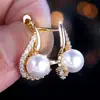 Pendientes Coreanos HuaJie Estilo Dongdaemun Exquisitos Pendientes Curvos Completamente Incrustados con Diamantes Imitación Perlas Pendientes de Lujo y Sofisticados