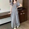 Nuevo estilo de verano para tallas grandes para mujeres de talla grande: Top casual de manga corta con espalda cruzada + falda de retazos de encaje conjunto de dos piezas