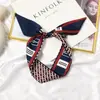 Lenço de seda lenço pequeno feminino Coreia do Sul pontudo fino tira estreita gravata elástico de cabelo cabelo novo primavera e verão faixa de cabelo versátil feminina