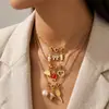 Collar de cadena fina de hueso de serpiente dorada con colgante de lazo desmontable de perlas estilo retro de chica dulce transfronterizo europeo y americano