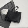 Bolso de gran capacidad de comercio exterior para mujer, primavera y verano 2025, nuevo bolso de hombro portátil a juego, bolso de mano de clase para ir al trabajo.
