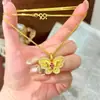Tienda de Oro Mismo Estilo Collar de Corazón Picado Chapado en Oro Alta Retención de Color Floral Mariposa Moneda de los Cinco Emperadores Collar Venta al por Mayor