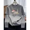 Estilo de dos piezas a rayas patchwork nuevo 2026, camiseta de algodón puro de manga larga para mujer, top de estilo americano moderno y versátil para otoño