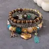 Produto popular de travessia de fronteira europeu e americano: Pulseira com pingente de coração estilo boho, pulseira de contas com cordão elástico multicamadas
