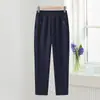 Calça Casual de Veludo Grossa Nova Outono e Inverno 2025 Cintura Alta com Elástico Calça Reta Solta para Mães de Meia-Idade e Idosas