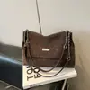 Bolso retro de alta gama con textura para mujer 2026 nuevo popular versátil bandolera con cadena bolso de hombro tipo tote de gran capacidad