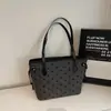 Bolsa de mano de gran capacidad, nuevo modelo primavera 2026, bolso de hombro para ir al trabajo, bolso de mano texturizado de nicho estilo coreano