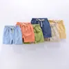 Pantalones cortos de niño hot pants 2020 nuevos de algodón y lino estilo coreano casual de verano modernos deportivos moda precio de fábrica al por mayor