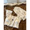 Pijama de seda helada de lunares con encaje estilo francés con copas en el pecho para mujer, conjunto de ropa de casa de verano dulce con shorts de manga corta