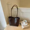 Bolso tote casual simple nuevo de principios de otoño 2026, bolso de hombro de alta estética y calidad, bolso de hombro de gran capacidad para el trabajo, moderno