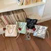 Bolso de Mano de Moda de Comercio Exterior Bolso Cubo Nuevo Primavera/Verano 2026 Bolso Versátil para Mujer Bolso Cruzado Bolso de Cadena Acolchado de Gama Alta