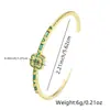 Pulsera abierta de moda transfronteriza con temperamento, incrustaciones de circón de color, chapada en cobre dorado, pulsera de lujo ligero para mujer, venta al por mayor