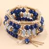 Traje de joyería bohemia de venta caliente transfronteriza europea y americana, traje de pulsera para mujer con borlas de cristal multicapa y cuentas