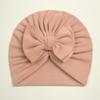 Otoño e invierno europeo y americano nuevo terciopelo alemán para niños gorro suave con lazo para bebé cálido gorro de punto liso sombrero para bebé