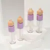 Nuevo tubo de brillo de labios con cadena de bolitas, herramienta dispensadora para tubo de brillo de labios, material de empaque cosmético, tubo de brillo de labios vacío