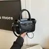 Bolso de Mano Nicho Simple y Versátil Estilo Coreano para Mujer, Nuevo Modelo Verano 2026, Bolso Cubo Cruzado de Textura de Alta Calidad