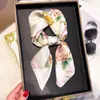 Primavera 2025 Nuevo Pañuelo Moda Estilo Occidental Combinable Cuadrado Pequeño 70cm Pañuelo Decorativo Protección Solar Chal de Viaje Mujer