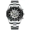 Fenzun FNGEEN nuevo reloj mecánico automático hueco de moda atmosférica con correa de acero para hombre, relojes de comercio exterior al por mayor