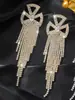 Pendientes de Borla Completos de Diamante Gota de Agua Super Brillantes Estilo Europeo y Americano para Mujer, Estilo Largo, Elegantes y de Hada, Pendientes de Moda con un Toque de Lujo, Hechos de Cobre Completo, Versátiles