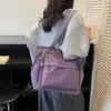 Bolsa de Lona de Grande Capacidade para Mulheres 2025 Novo Estilo Bolsa Tote para Trabalho e Deslocamento Bolsa de Mão Casual para Estudantes Bolsa de Ombro