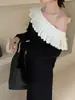 Tricô de Lã Longa com Ruffle e Recorte Estilo Coreano Ombro a Ombro 2025 Novo Estilo Outono Top Feminino com Efeito Emagrecedor