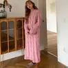 Otoño e invierno 2019 viento perezoso versión coreana de suéter largo de punto liso holgado falda suéter de cuello redondo para mujer salida de fábrica