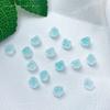 Doce Pérola azul claro manicure material pacote tamanho flor botão manicure joias diy handmade wear unha material pacote